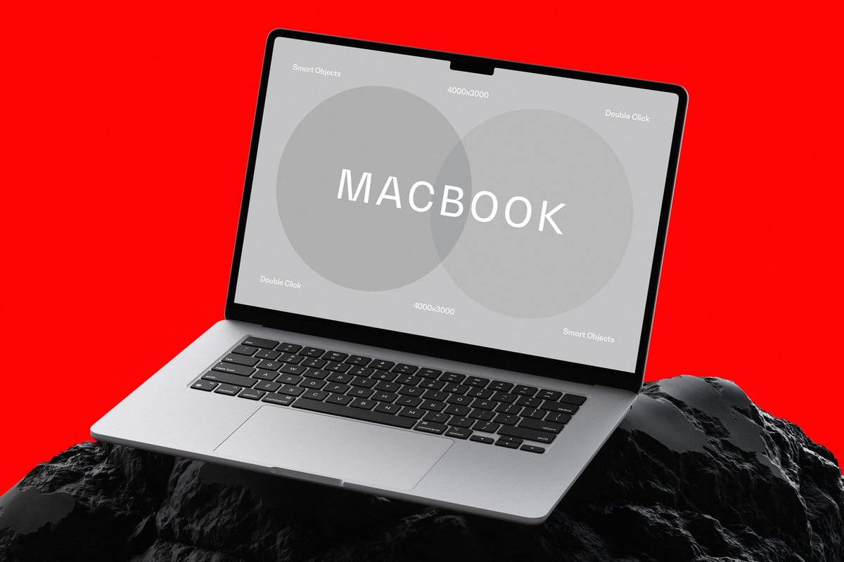 石头上的 Macbook Air 电脑样机 (PSD)